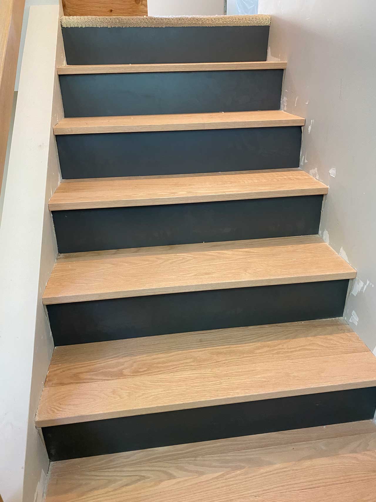 Expert staircase installation with beautiful hardwood treads