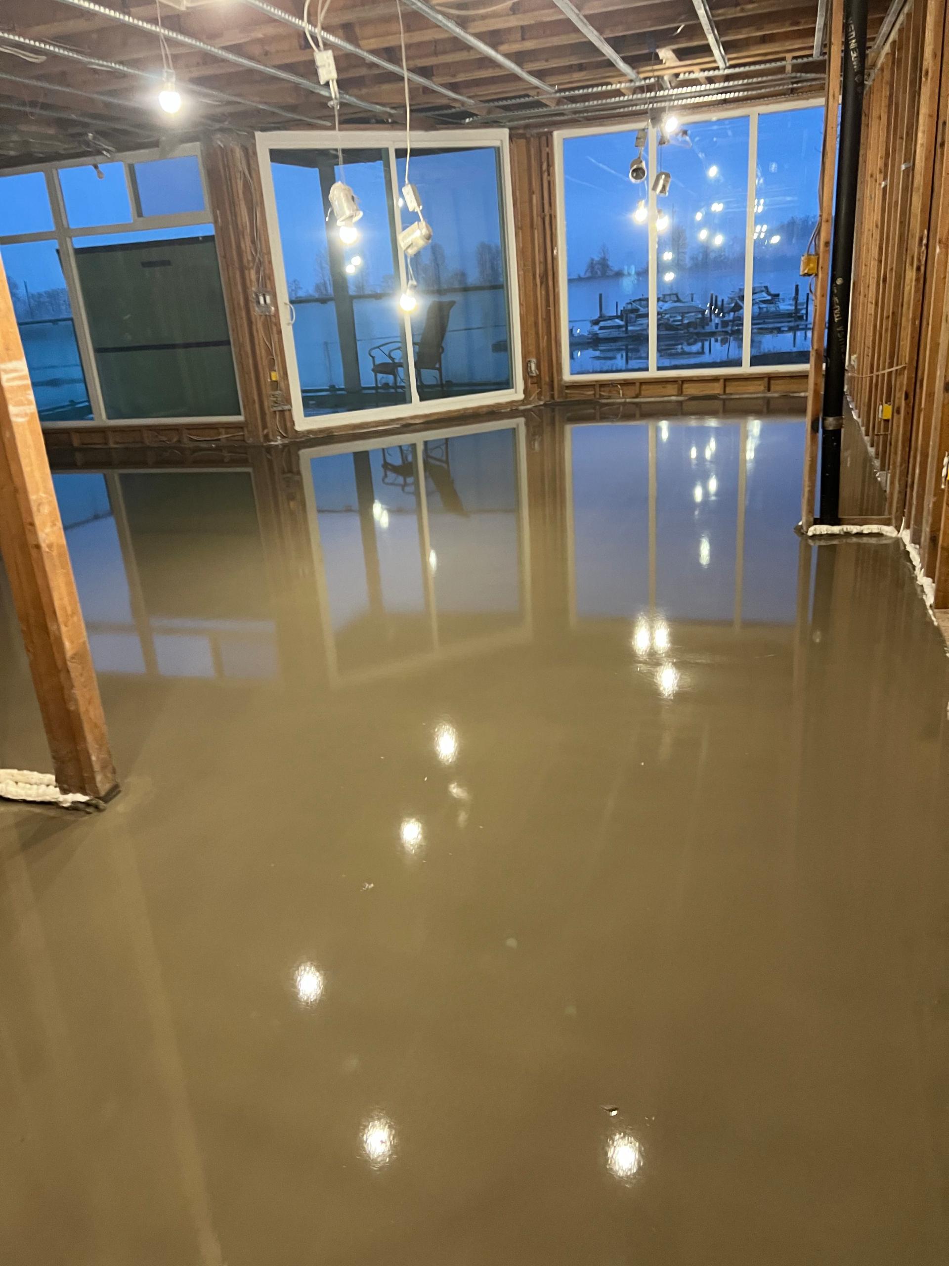 Professional floor leveling service with self-leveling compound in Vancouver waterfront property