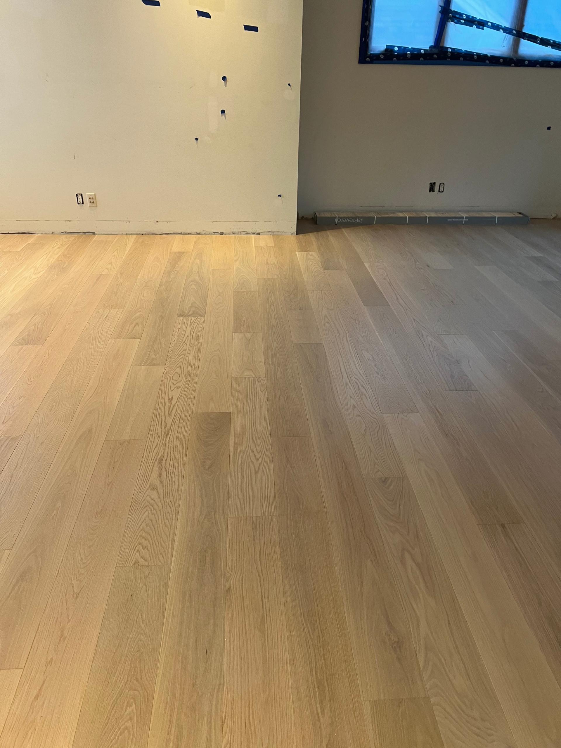 Newly installed hardwood flooring with stunning grain patterns